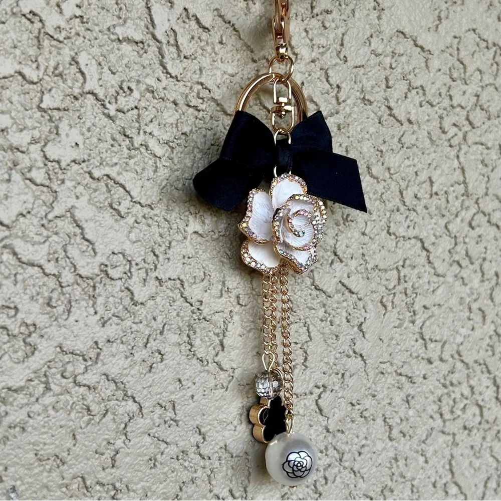 Luxe White Floral Keychain/Bag Charm with Black Bow